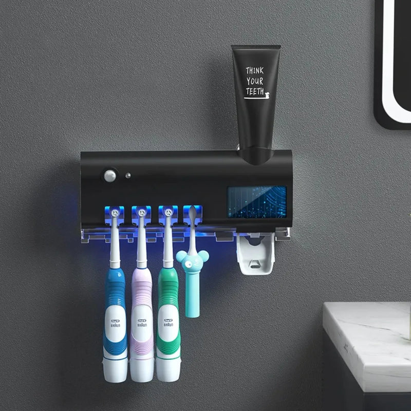 Dispensador dentífrico e escova titular, aplicador dentífrico, uso do banheiro